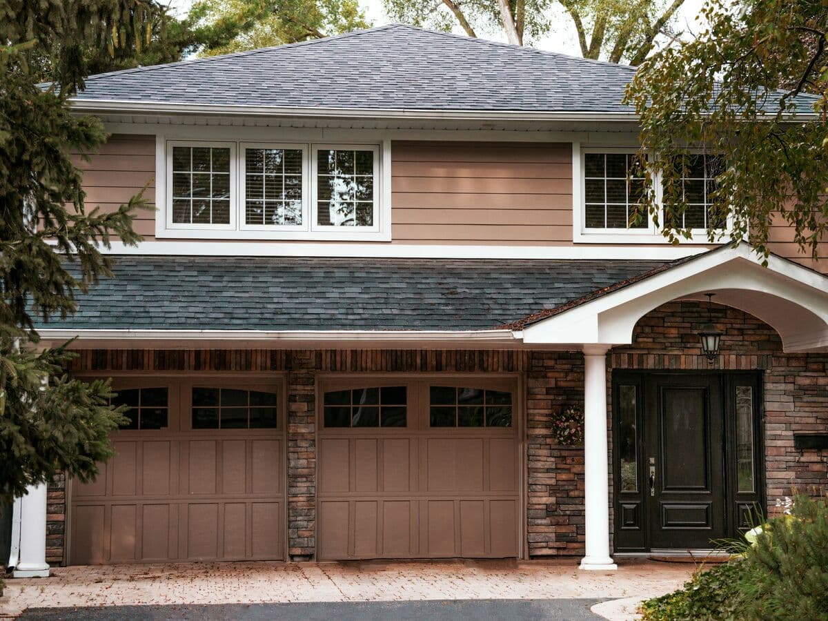 Two-story home with a covered front entry